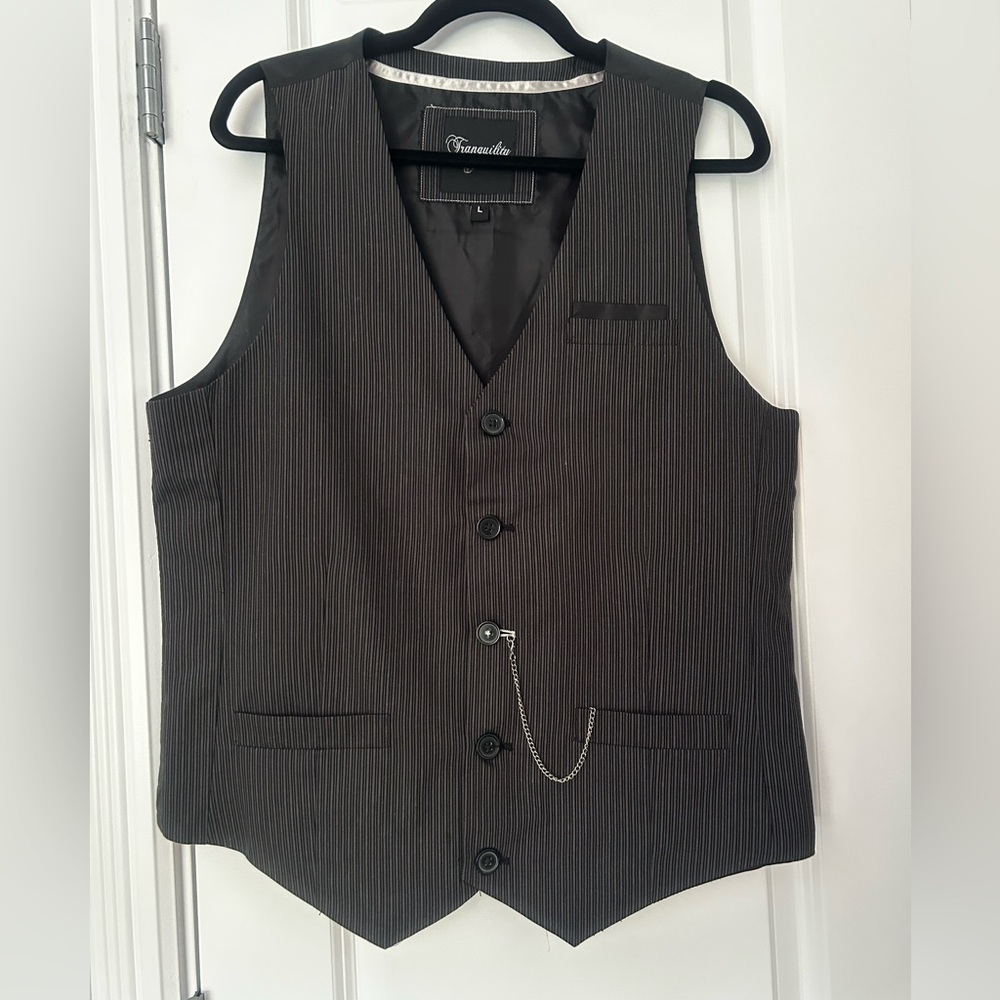 Pinstripe vest.
